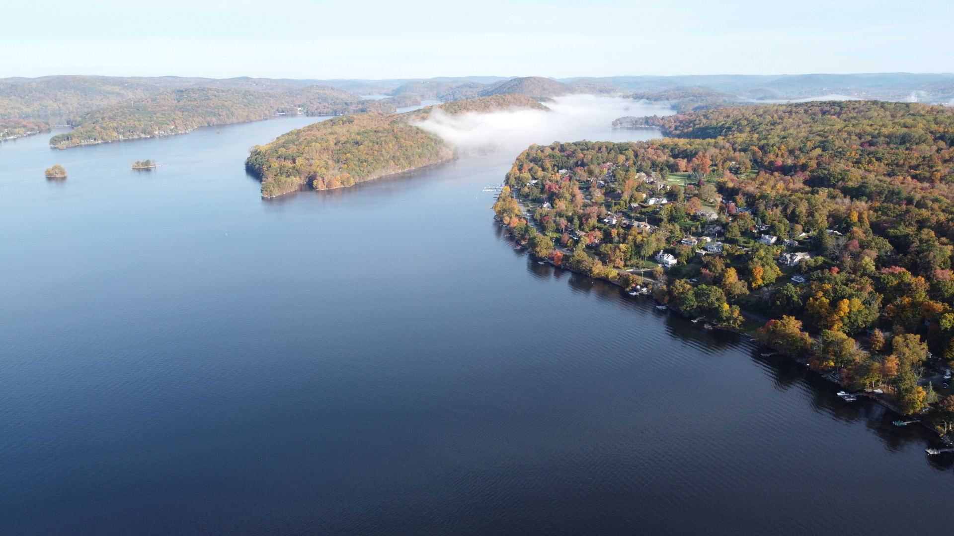 A tranquil morning on Candlewood Lake, inviting anglers of all ages.